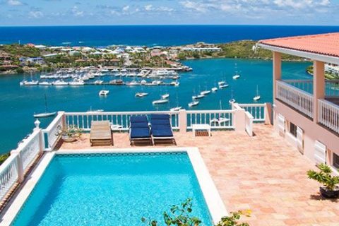 Deluxe vacation villa is set just above Oyster Pond St. Maarten