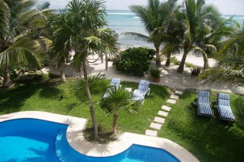 Enjoy a tropical beach vacation in this beachfront vacation villa on the Riviera Maya