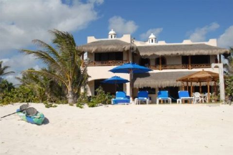 Beachfront vacation rental sits on the beach of Jade Bay and includes a range of luxury amenities