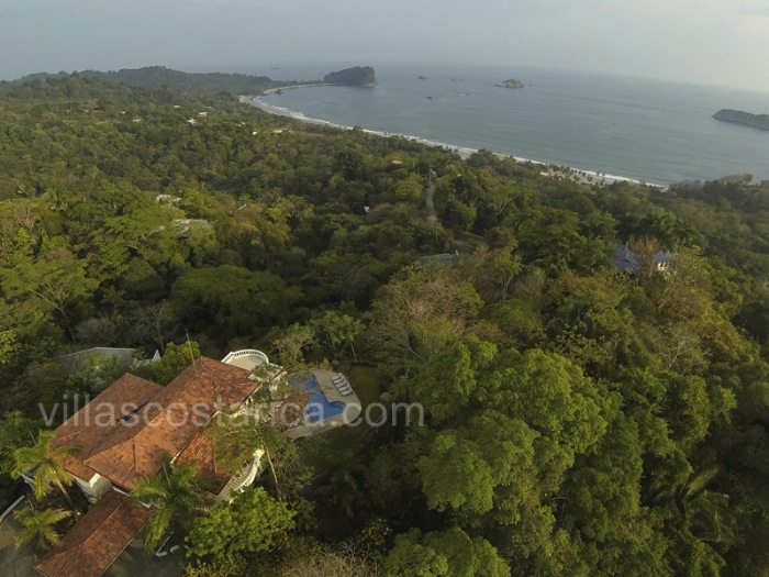 A birds-eye view of the beautiful villa shows how it looks out over the entire coastline from this altitude.