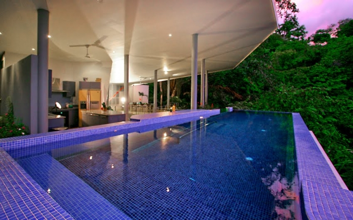 Jungle surrounds the large private infinity pool, a magical spot in the evening and a great place to watch for monkeys!