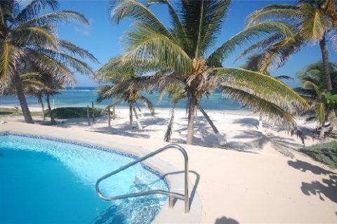 Grand Cayman beachfront oceanside pool luxury villa in the Caribbean