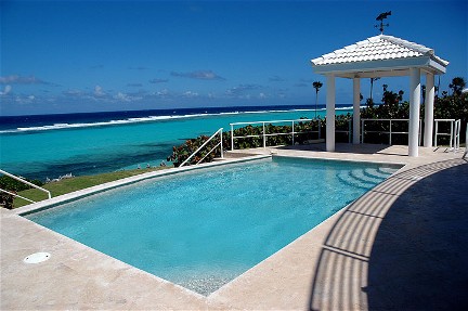 Relax in the oceanview private pool of this grand Cayman vacation rental