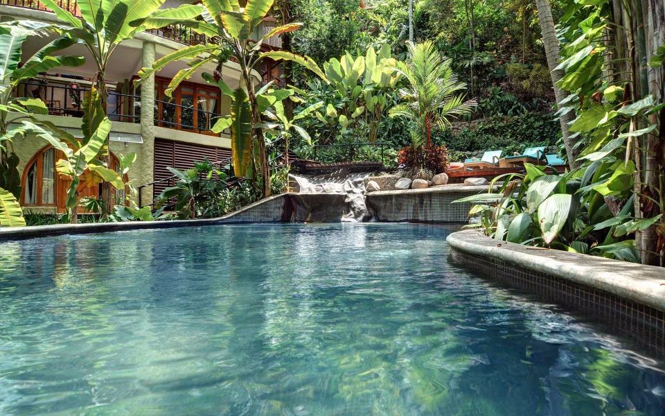 Enjoy the crystal waters in your huge lagoon-style pool and refresh under the waterfall.