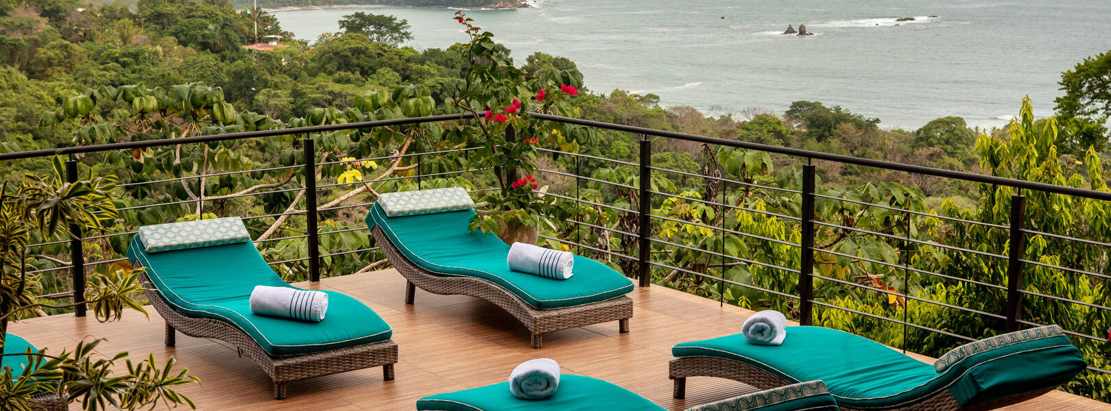 Exquisite, luxurious loungers are strategically positioned to bask in the sun while reveling in the awe-inspiring view.